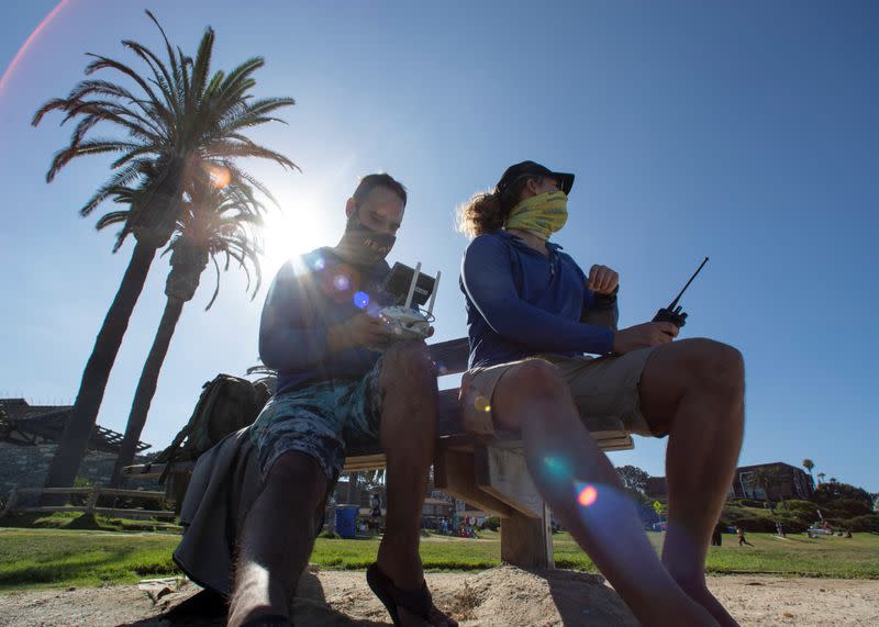 Marine biologists from Cal State Lone Beach Shark Lab study sharks along the California coast