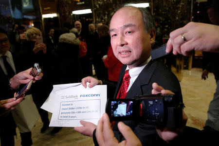 Softbank CEO Masayoshi Son speaks to the press after meeting with U.S. President-elect Donald Trump at Trump Tower in Manhattan, New York City, U.S., December 6, 2016. REUTERS/Brendan McDermid