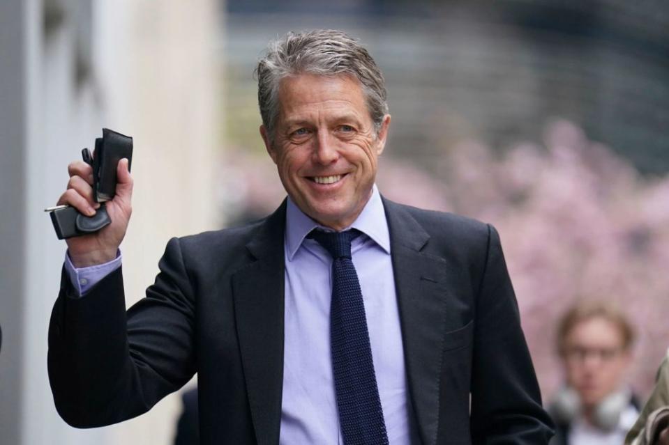 Hugh Grant let slip that he has been mulling over pursuing a political career. James Manning/PA via AP