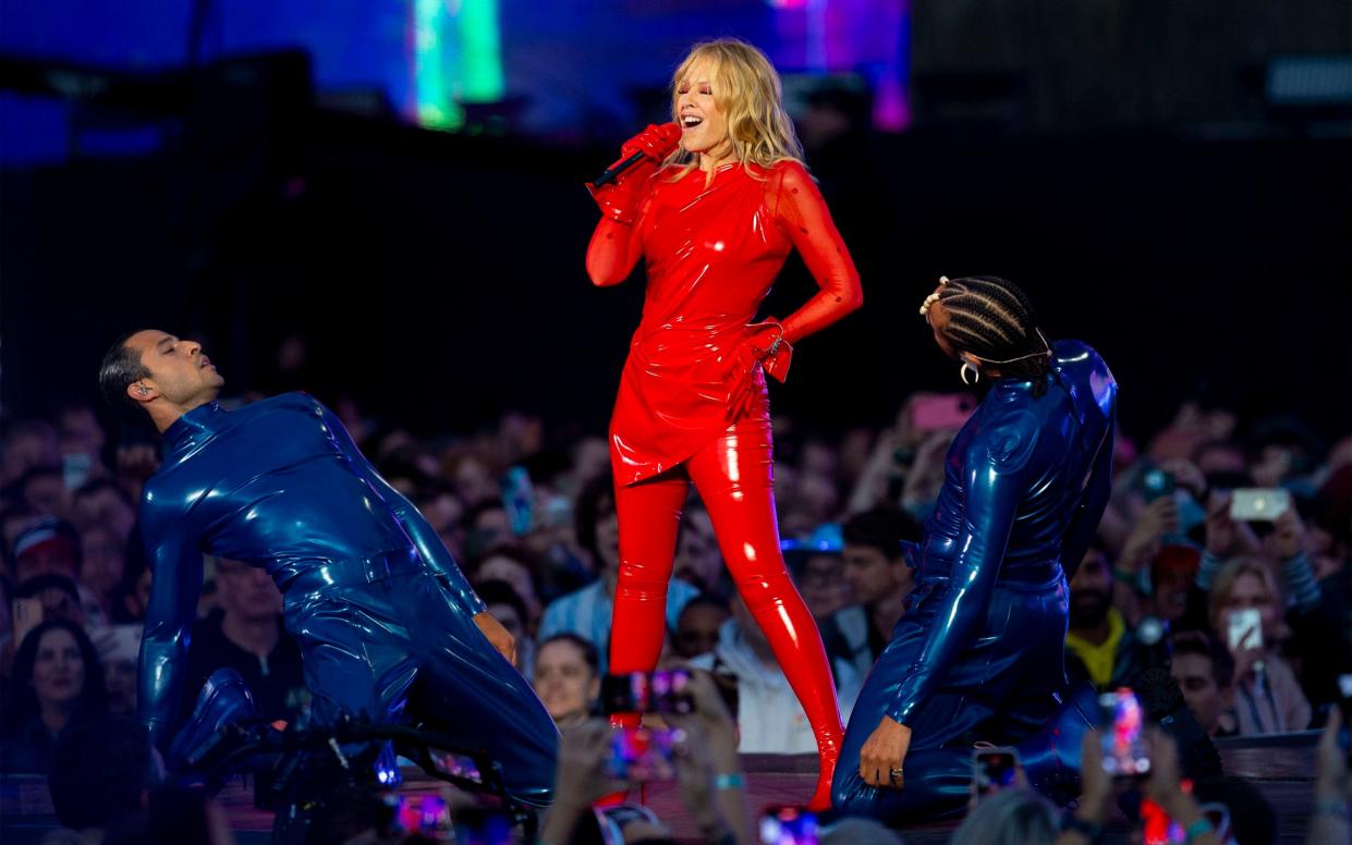 Like a cross between a Durex advert and Teletubbies: Kylie Minogue and her latex-covered dancers