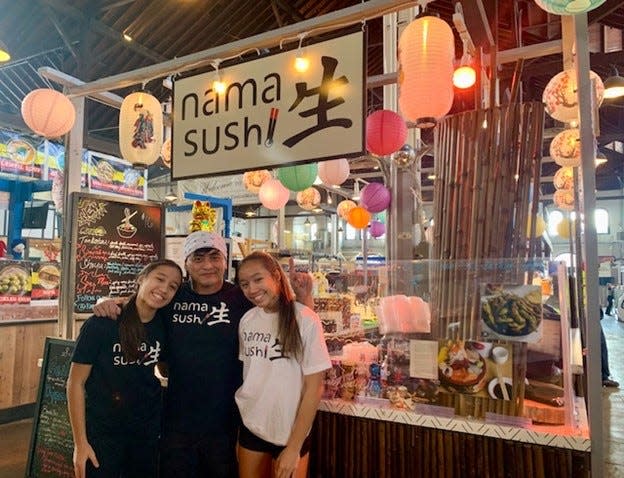 The quaint, colorful stand adorned with red and purple paper lanterns, vibrant drinks on display, and positive energy greeting you, Nama Sushi stands out in Central Market.