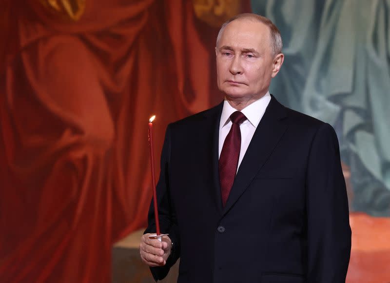Russian President Putin attends Orthodox Easter service