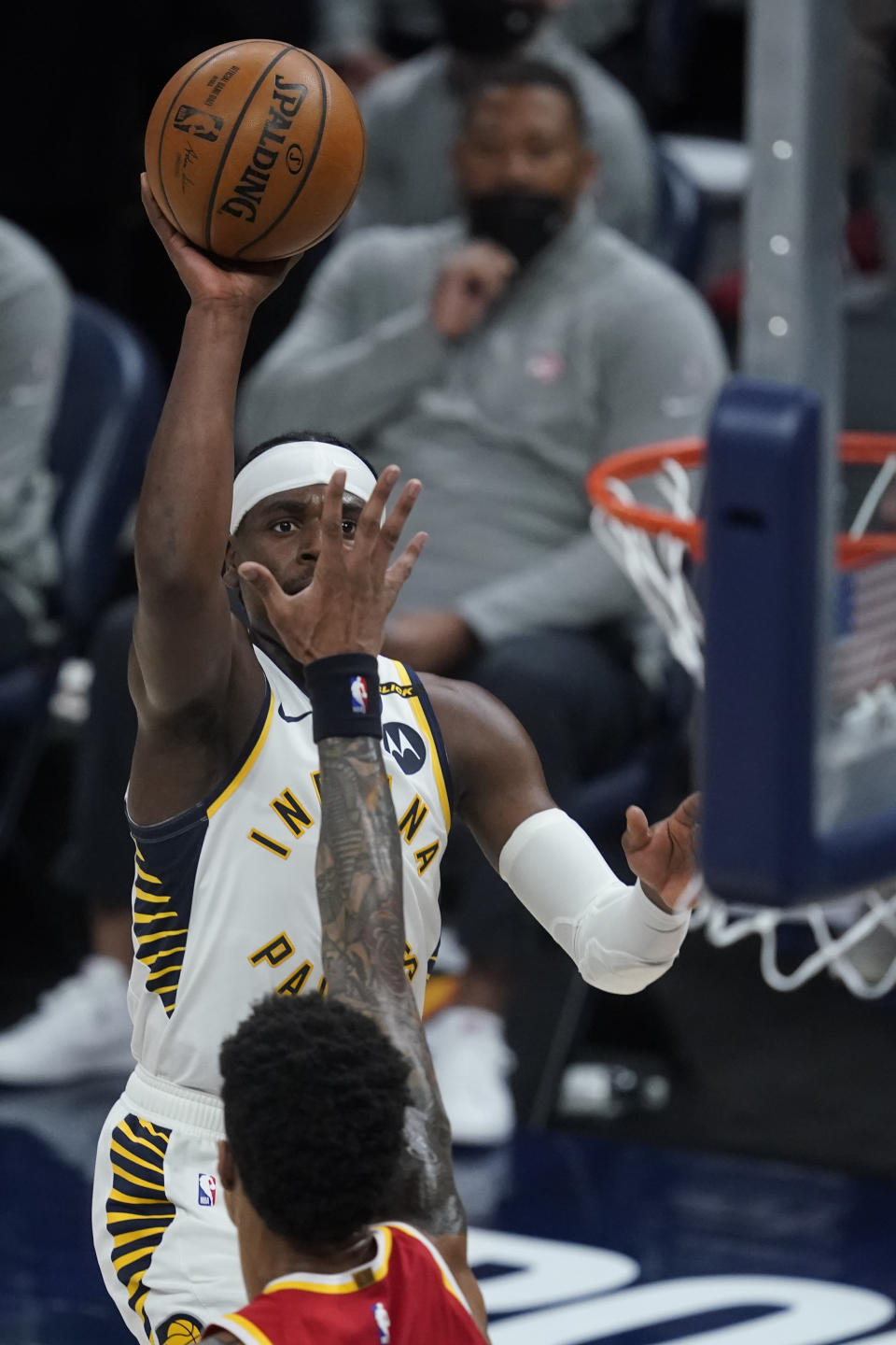 Indiana Pacers' Aaron Holiday shoots during the second half of the team's NBA basketball game against the Atlanta Hawks, Thursday, May 6, 2021, in Indianapolis. (AP Photo/Darron Cummings)