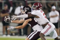 Alabama defensive back Caleb Downs, right, knocks away a pass intended for Mississippi State wide receiver Creed Whittemore during the first half of an NCAA college football game, Saturday, Sept. 30, 2023, in Starkville, Miss. (AP Photo/Rogelio V. Solis)