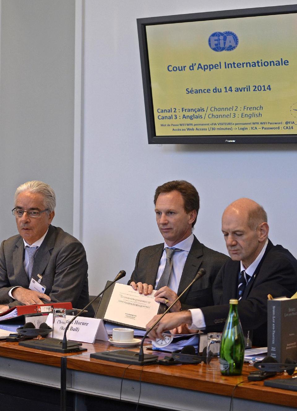 Red Bull technical director Adrian Newey, right, and Red Bull team principal Christian Horner, center, attend the International Automobile Federation (FIA) Appeal Court hearing, Paris, Monday, April 14, 2014. The dispute resolution tribunal for motorsport is hearing Red Bull's case against the disqualification of Daniel Ricciardo from the Australian Grand Prix. (AP Photo/Eric Vargiolu, Pool)