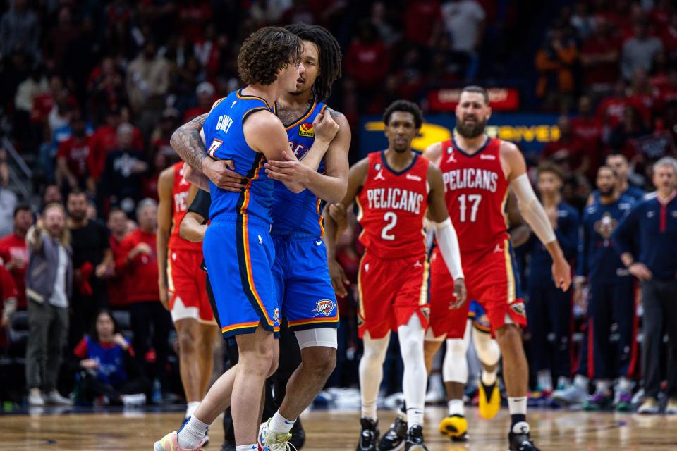 Apr 12, 2023; New Orleans, Louisiana, USA; Oklahoma City Thunder forward Jaylin Williams (6) holds back guard Josh Giddey (3) after being run into by New Orleans Pelicans guard Josh Richardson (2) during the second half at Smoothie King Center. Mandatory Credit: Stephen Lew-USA TODAY Sports