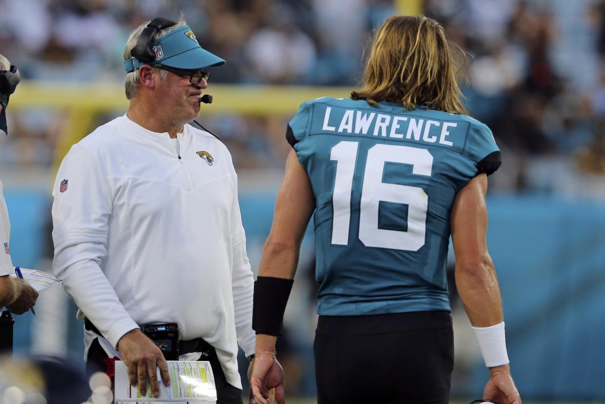 Jaguars executive Tony Khan is optimistic new head coach Doug Pederson (left) can help take franchise quarterback Trevor Lawrence to another level. (AP Photo/Gary McCullough)