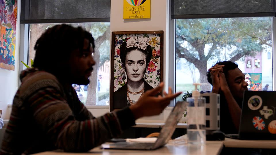 University of Texas at Austin students continue to make use of a space that housed the school's "Multicultural Center" after the name was removed from the wall. - Eric Gay/AP