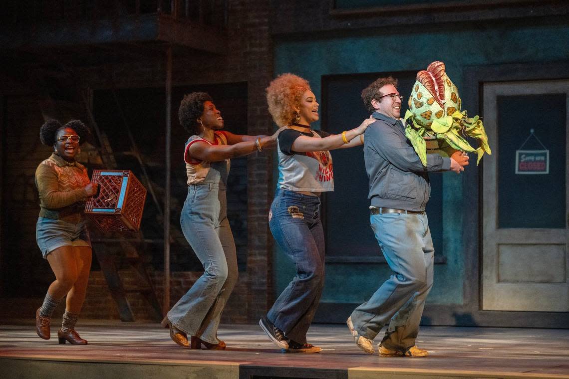 Amari Lewis, from left, as Chrystal, Chioma Anyanwu as Ronette, Alyssa Byers as Chiffon, and Jordan Matthew Brown as Seymour perform during the final dress rehearsal of the “Little Shop of Horrors,” at the KC Rep.