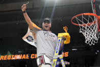 South Carolina guard Te-Hina Paopao (0) holds up a piece of the net after defeating Oregon State in an Elite Eight round college basketball game during the NCAA Tournament, Sunday, March 31, 2024, in Albany, N.Y. (AP Photo/Mary Altaffer)