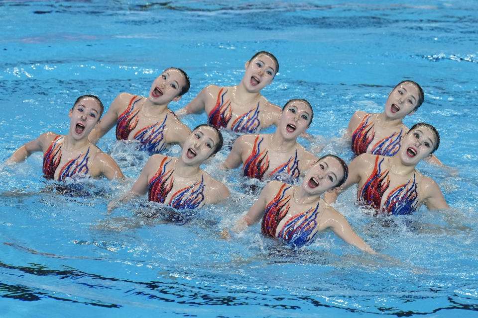 China team compete in the mixed team technical final of artistic swimming at the World Aquatics Championships in Doha, Qatar, Tuesday, Feb. 6, 2024. (AP Photo/Lee Jin-man)