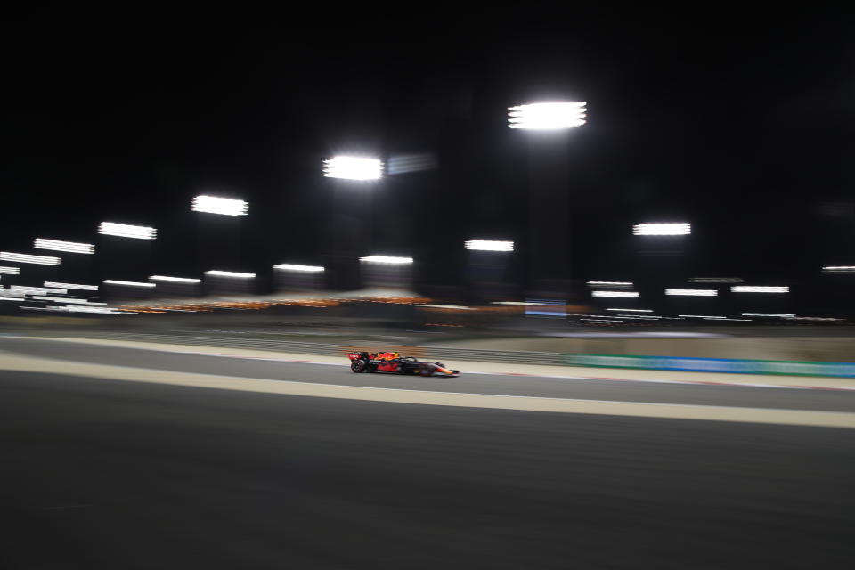 Red Bull driver Alexander Albon of Thailand steers his car during the second free practice at the Formula One Bahrain International Circuit in Sakhir, Bahrain, Friday, Nov. 27, 2020. (Tolga Bozoglu, Pool via AP)