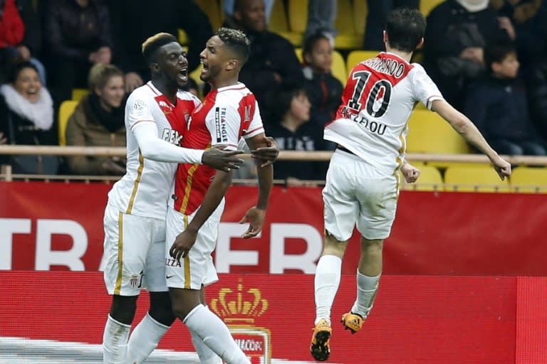 Monaco's French Midfielder Tiemoue Bakayoko (L) celebrates with teammates after scoring a goal during the French L1 football match between Monaco (ASM) and Nice (OGCN) at Louis II Stadium in Monaco on February 6, 2016