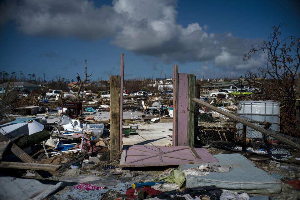 The rubble of a destroyed neighborhood stands in the aftermath of Hurricane Dorian in Abaco, Bahamas, Tuesday, Sept. 17, 2019. Dorian hit the northern Bahamas on Sept. 1, with sustained winds of 185 mph (295 kph), unleashing flooding that reached up to 25 feet (8 meters) in some areas. (AP Photo/Ramon Espinosa)