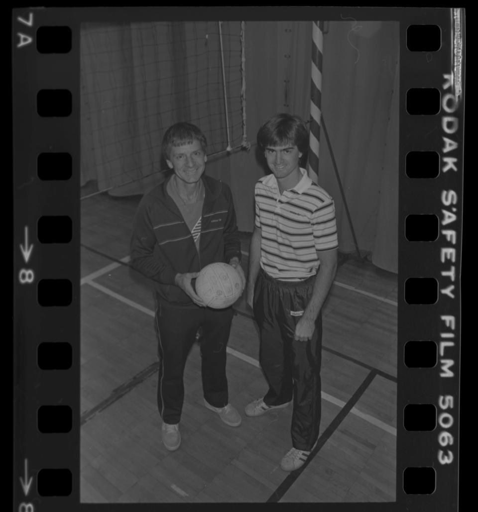 Ball State University men's volleyball coach Don Shondell with his son Burris Laboratory Girls volleyball coach Steve Shondell in 1983.