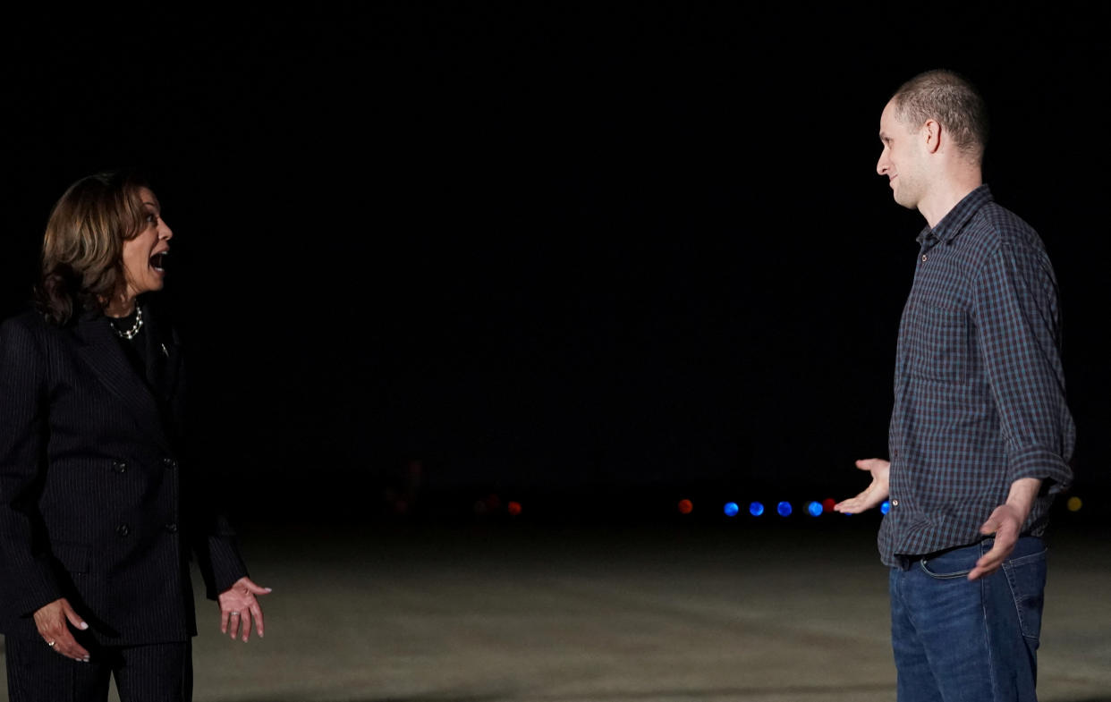 U.S. Vice President Kamala Harris reacts as she meets Evan Gershkovich, who was released from detention in Russia, upon his arrival at Joint Base Andrews in Maryland, U.S., August 1, 2024. REUTERS/Nathan Howard