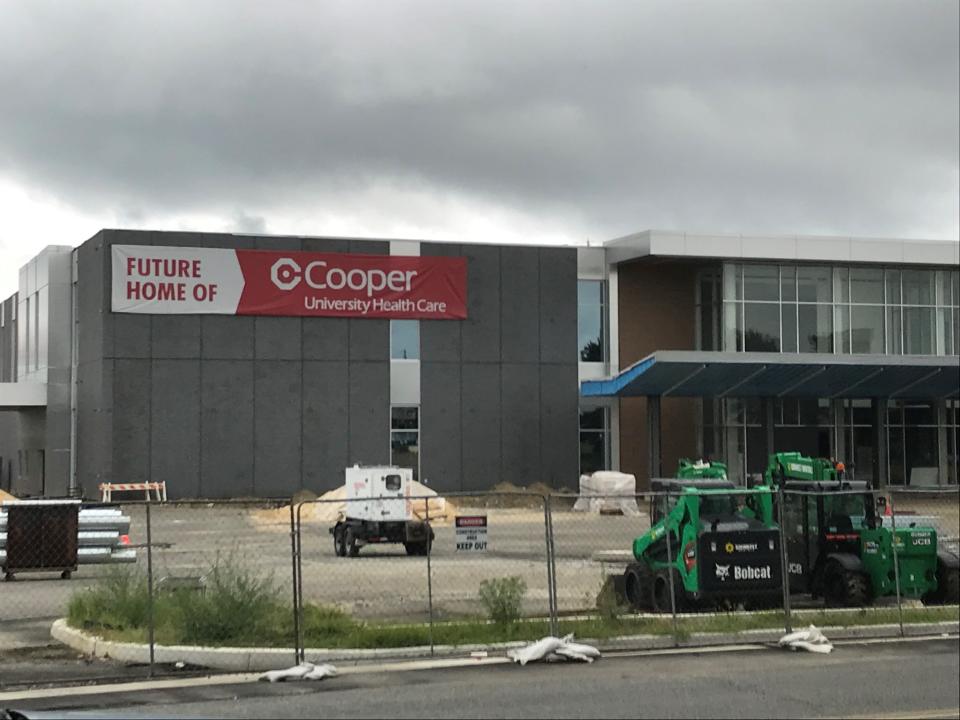 Cooper University Health Care outpatient center's entrance facade nears completion at Moorestown Mall on Aug 4, 2023.