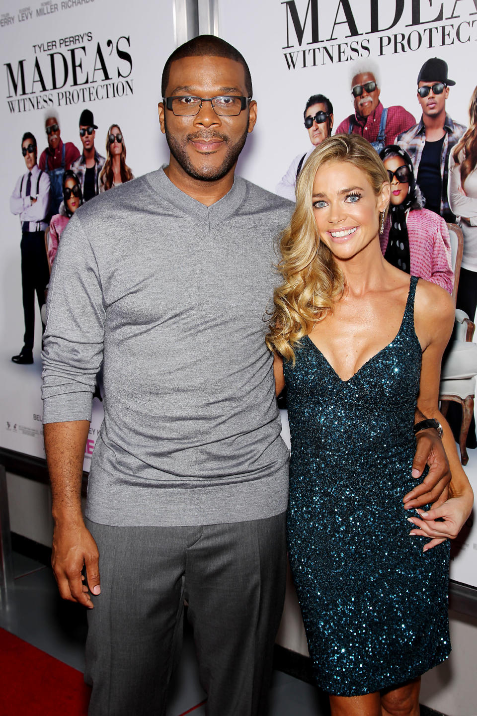 This June 25, 2012 photo released by Starpix shows actors Tyler Perry, left, and Denise Richards, at the premiere of the Lionsgate film, "Tyler Perry's: Madea's Witness Protection," at the AMC Lincoln Square Theater in New York. The film, starring Perry, Richards, Romeo, and Eugene Levy, opens nationwide on June 29. (AP Photo/Starpix, Marion Curtis)