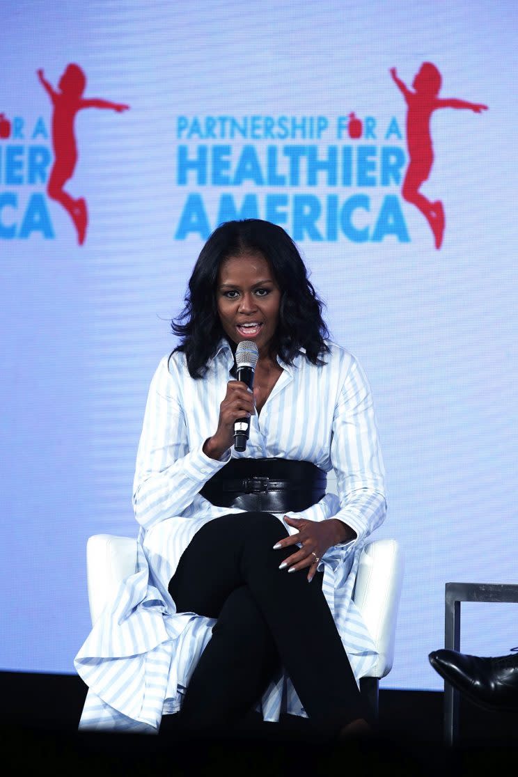 <i>Michelle Obama chose a stand-out striped shirt by small British label palmer//harding [Photo: Getty]</i>