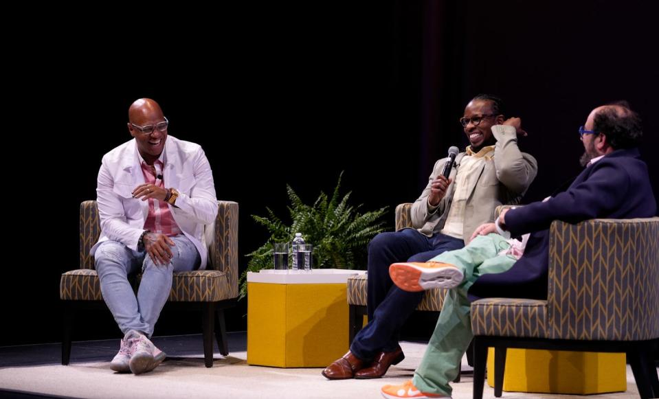 Joel Christian Gill, Ibram X. Kendi and moderator Seth Goldenberg talk at the Woodman Performance Center at Moses Brown School.