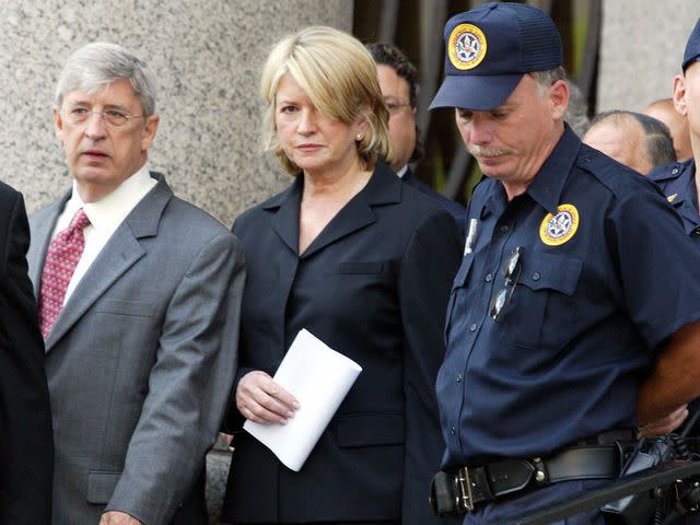 <p>DON EMMERT/AFP/Getty</p> Martha Stewart leaves the Manhattan Federal Court after being sentenced on July 16, 2004.