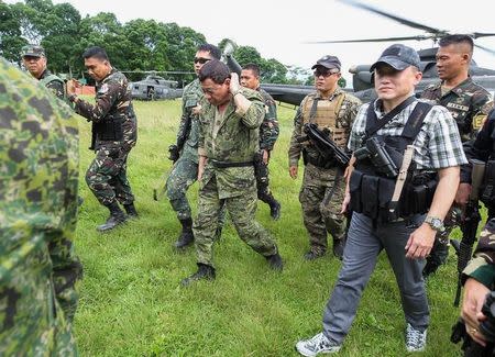 Philippine President Rodrigo Duterte arrives at the military camp in Marawi city, southern Philippines July 20, 2017. Malacanang presidential palace/Handout via Reuters