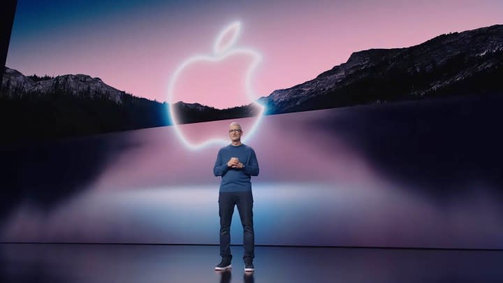 Apple CEO, Tim Cook, stands on stage at the September 2021 Fall Apple Event.