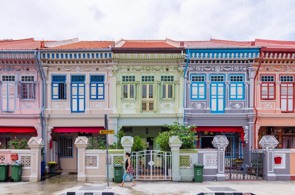 While traveling through Asia, Rachel sees&nbsp;Peranakan terrace houses (&agrave; la the ones pictured above on Joo Chiat Road in Singapore). The book also mentions that Astrid owns a row of historic Peranakan shop houses on Singapore's Emerald Hill.