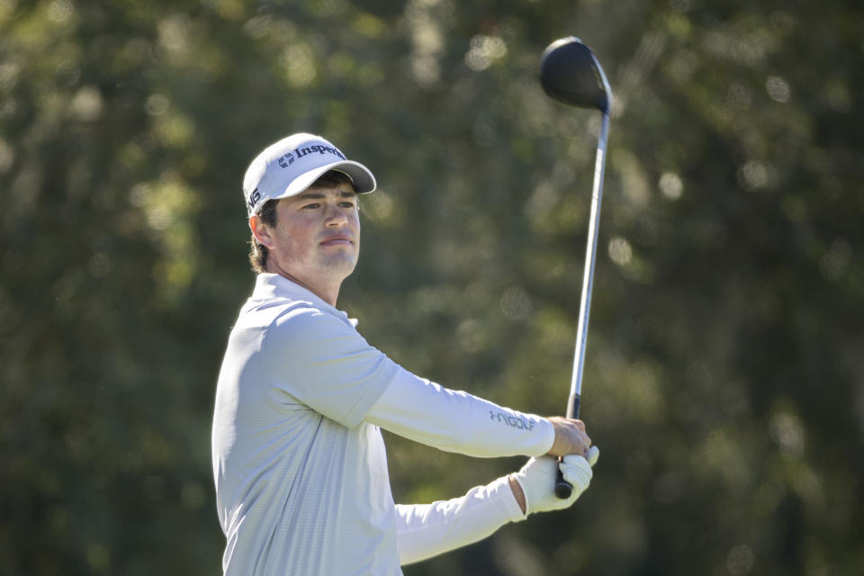 Cole Hammer watches his drive down the second fairway during the second round of the RSM Classic golf tournament, Friday, Nov. 18, 2022, in St. Simons Island, Ga. (AP Photo/Stephen B. Morton)