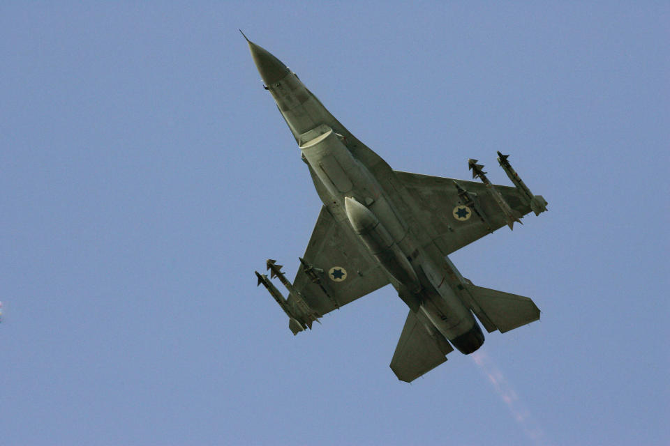 FILE - In this Sunday, July 16, 2006 file photo an Israeli F-16 warplane takes off to a mission in Lebanon from an air force base in northern Israel. A rising chorus of Israeli voices is again raising the possibility of carrying out a military strike on Iran’s nuclear facilities in what appears to be an attempt to draw renewed attention to Tehran’s atomic program - and Israel’s unhappiness with international negotiations with the Iranians. (AP Photo/Ariel Schalit, File)