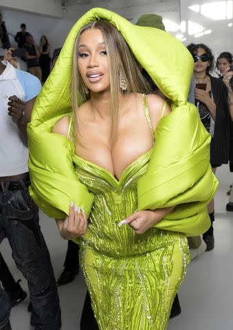 <p>Kristy Sparow/Getty Images</p> Cardi B in Paris in July 2023