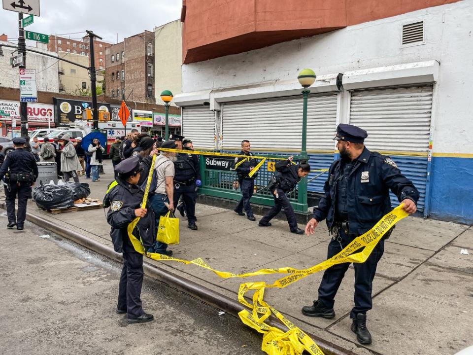 Wild video posted on social media shows the moment the accused attacker is surrounded by cops as the outraged mob tries to mete out street justice. Timothy Fadek