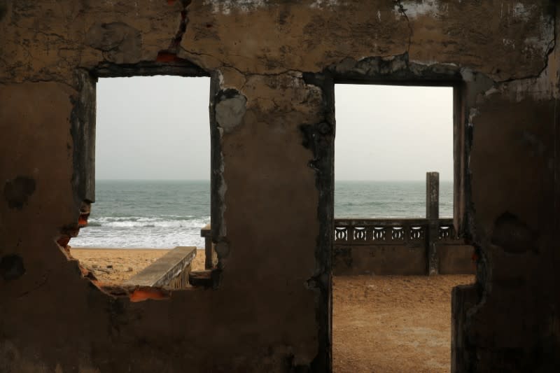 The sea is seen from the windows of the ruined house of former Chief of Afidegnigban, Kokou Denis Apedo, at the sandy beaches of Afidegnigban