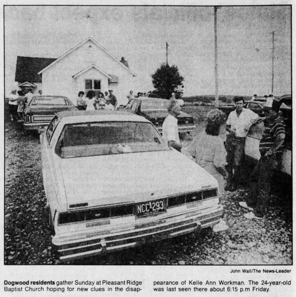 A newspaper clipping from July 3, 1989 depicts community members gathering at Pleasant Ridge Baptist Church to search for Kelle Ann Workman, who went missing on June 30, 1989. Her body was found on July 7, 1989.