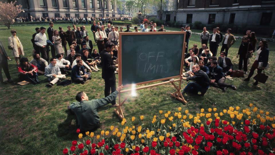 Professor Stephen Smale of Berkeley, a guest lecturer in Topology and Structural Stability, holds a class in front of Columbia's University's Low Memorial Library. The library, at left rear, and the mathematics building, right, were both held by student demonstrators. - Bettmann Archive/Getty Images