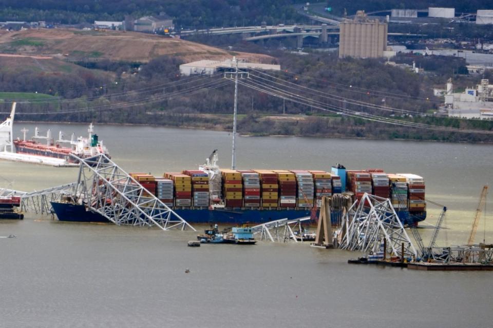 Wreckage of the Francis Scott Key Bridge rests on the container ship Dali (AP)