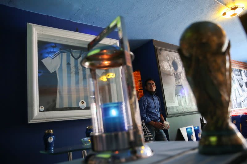 A fan is pictured at the first Mexico's church in memory of soccer legend Diego Armando Maradona in San Andres Cholula