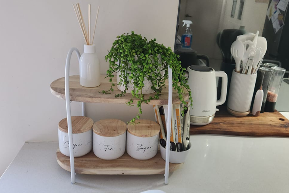 Kmart’s 2 Tier Arch Blonde Serve Stand used as a coffee station.