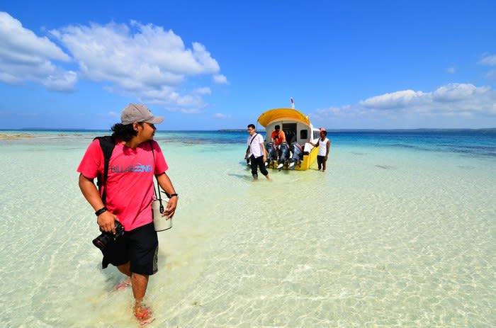 Matakus Island: Once you plunge your feet into this island's crystal clear warm water and bury your toes in the soft, powdery, sandy floor, you will forget all about the hassle, as well as all the rest of your far, far away problems.