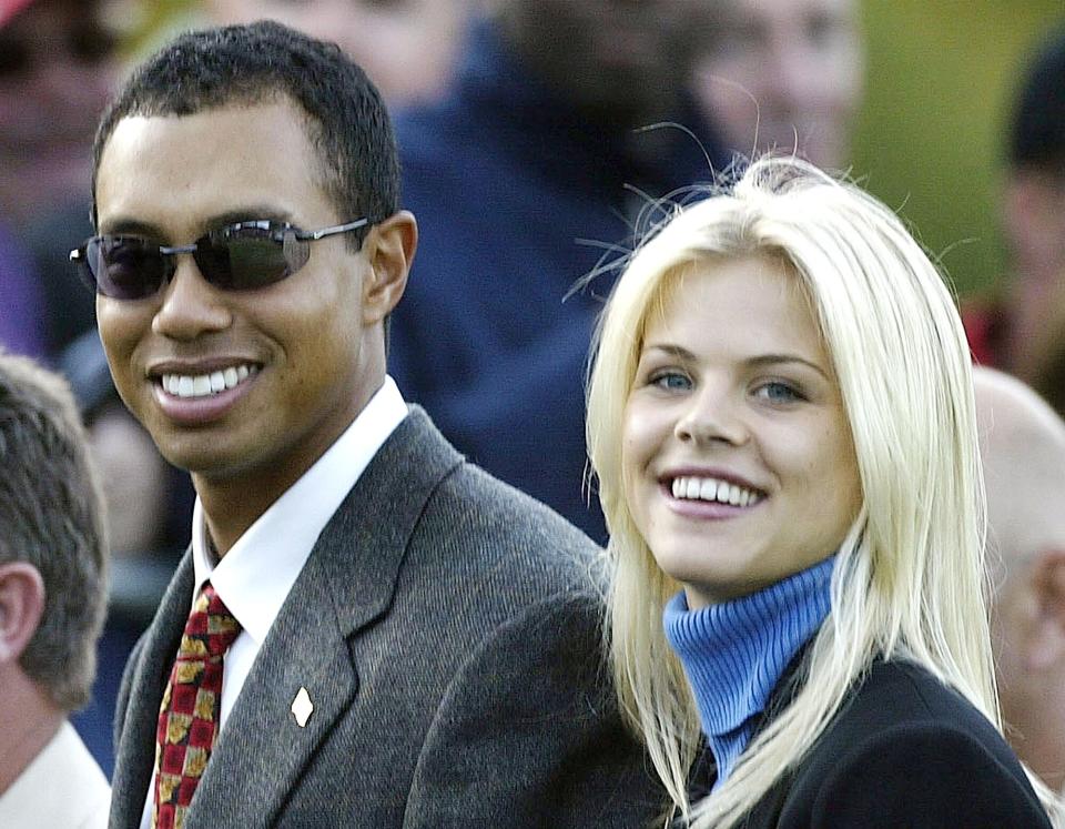 Tiger Woods poses with girlfriend Elin Nordegren during the opening ceremony for the 34th Ryder Cup September 26, 2002 in Sutton Coldfield, England