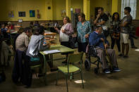 <p>A woman votes at a polling station in Madrid, May 24, 2015. (AP Photo/Andres Kudacki) </p>