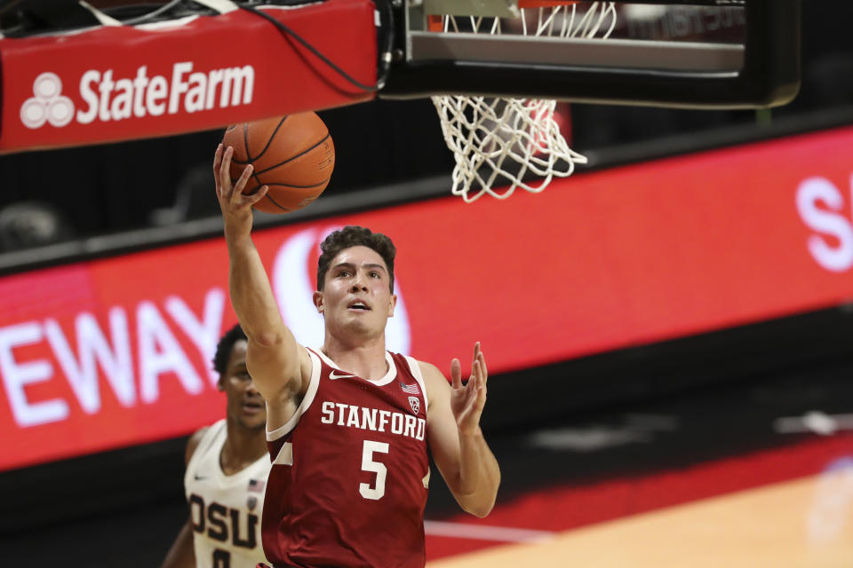 Stanford's Michael O'Connell (5) drives in to the basket during the first half of an NCAA college basketball game against Oregon State in Corvallis, Ore., Monday, Jan. 4, 2021. (AP Photo/Amanda Loman)