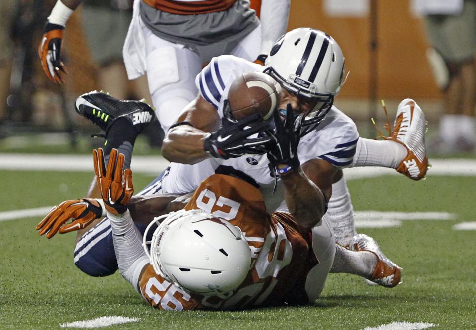 BYU receiver Jordan Leslie catches a pass against Texas’ Antwuan Davis during game against Texas in Austin, Texas, Saturday, Sept. 6, 2014. | Michael Thomas, Associated Press