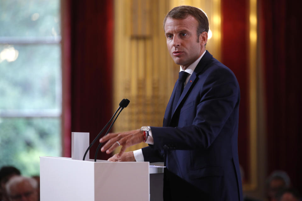 French President Emmanuel Macron delivers a speech during the annual French ambassadors' conference at the Elysee Palace in Paris, France, Monday, Aug. 27, 2018. (Philippe Wojazer/Pool Photo via AP)