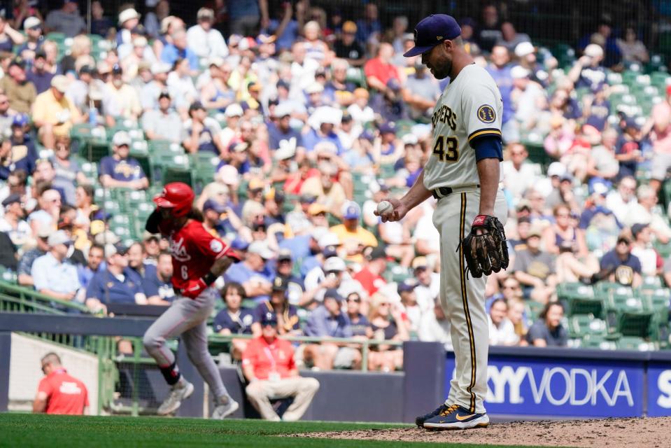 Milwaukee Brewers relief pitcher Hunter Strickland reacts after giving up a three-run home run to Cincinnati Reds' Jonathan India during the fifth inning of a baseball game Thursday, Aug. 26, 2021, in Milwaukee. (AP Photo/Morry Gash)