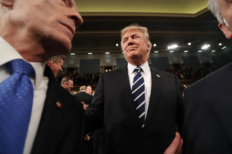 WASHINGTON, DC - FEBRUARY 28:  (AFP OUT) U.S. President Donald Trump arrives to deliver an address to a joint session of the U.S. Congress on February 28, 2017 in the House chamber of the U.S. Capitol in Washington, DC. Trump's first address to Congress is expected to focus on national security, tax and regulatory reform, the economy, and healthcare. (Photo by Jim Lo Scalzo - Pool/Getty Images)