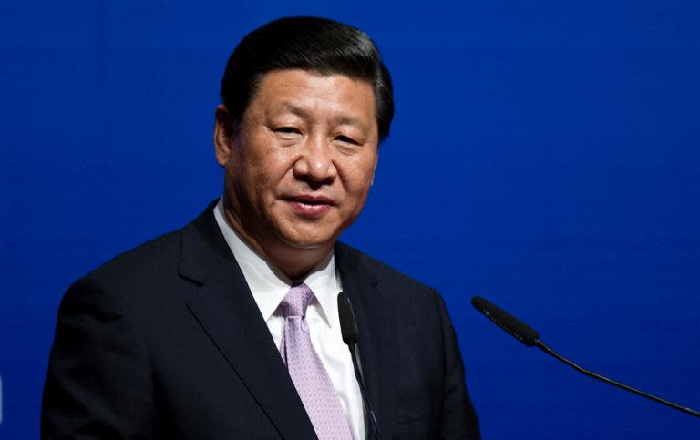 China's President Xi Jinping speaks during the Malaysia-China Economic Summit in Kuala Lumpur on October 4, 2013