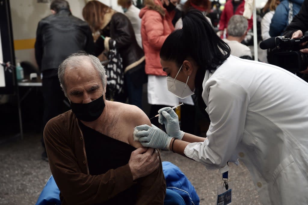 A man receives a dose of the Covid-19 vaccine in Thessaloniki (AFP via Getty Images)