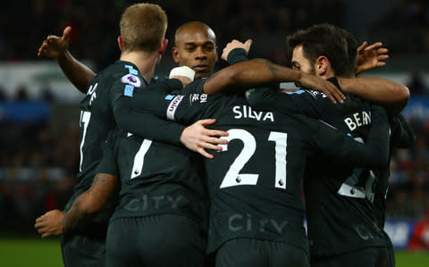 David Silva and teammates celebrate - Credit: AFP