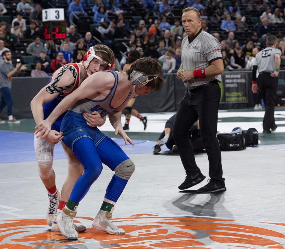 Ocean's James Farina (back), shown defeating Kittatinny's Reece Smith 10-1 in a 144-pound first-round bout, advanced to the quarterfinals.